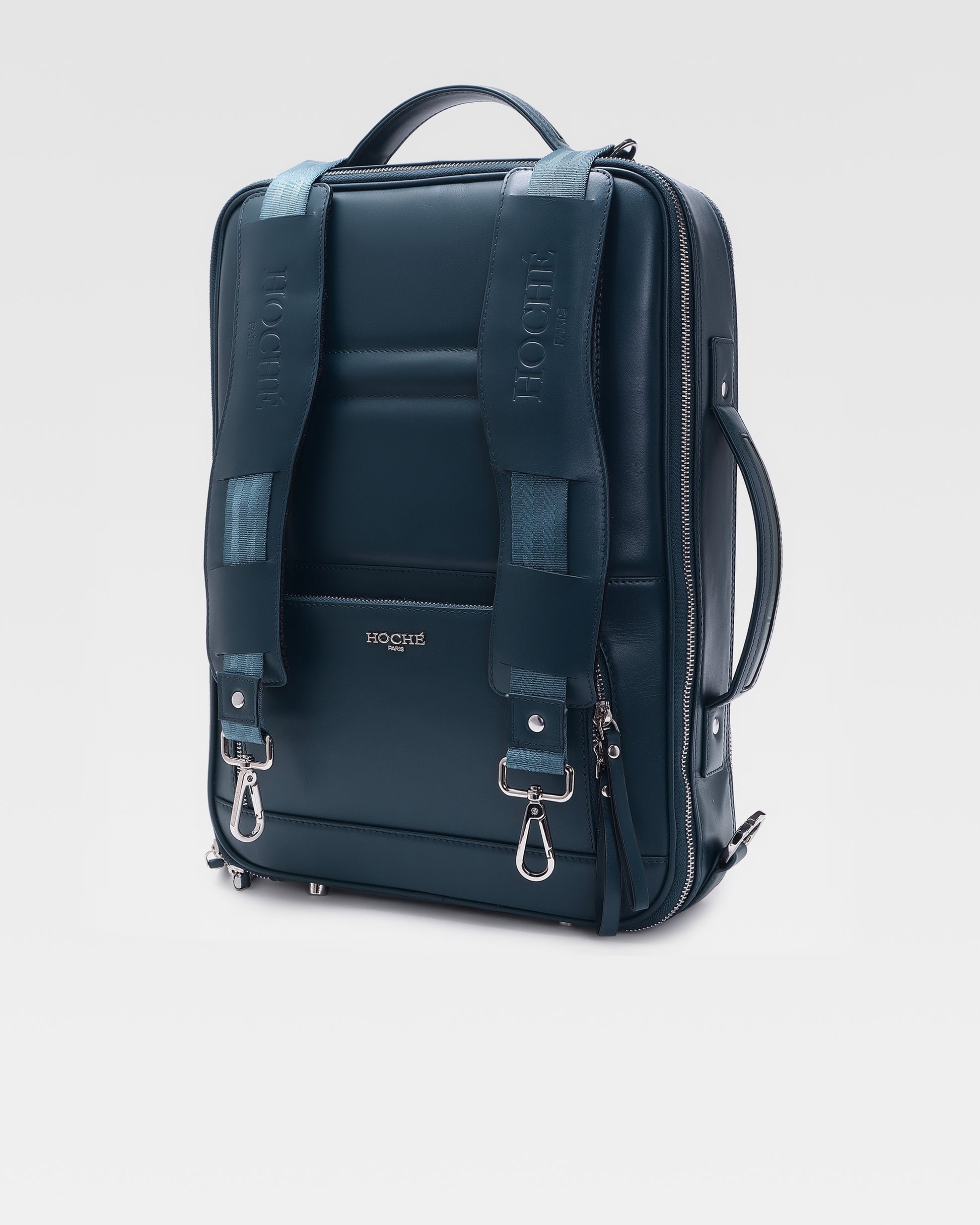 Side profile of UniSwitch dark blue genuine leather laptop backpack for men in India, showcasing its convertible 3-in-1 design for professionals.