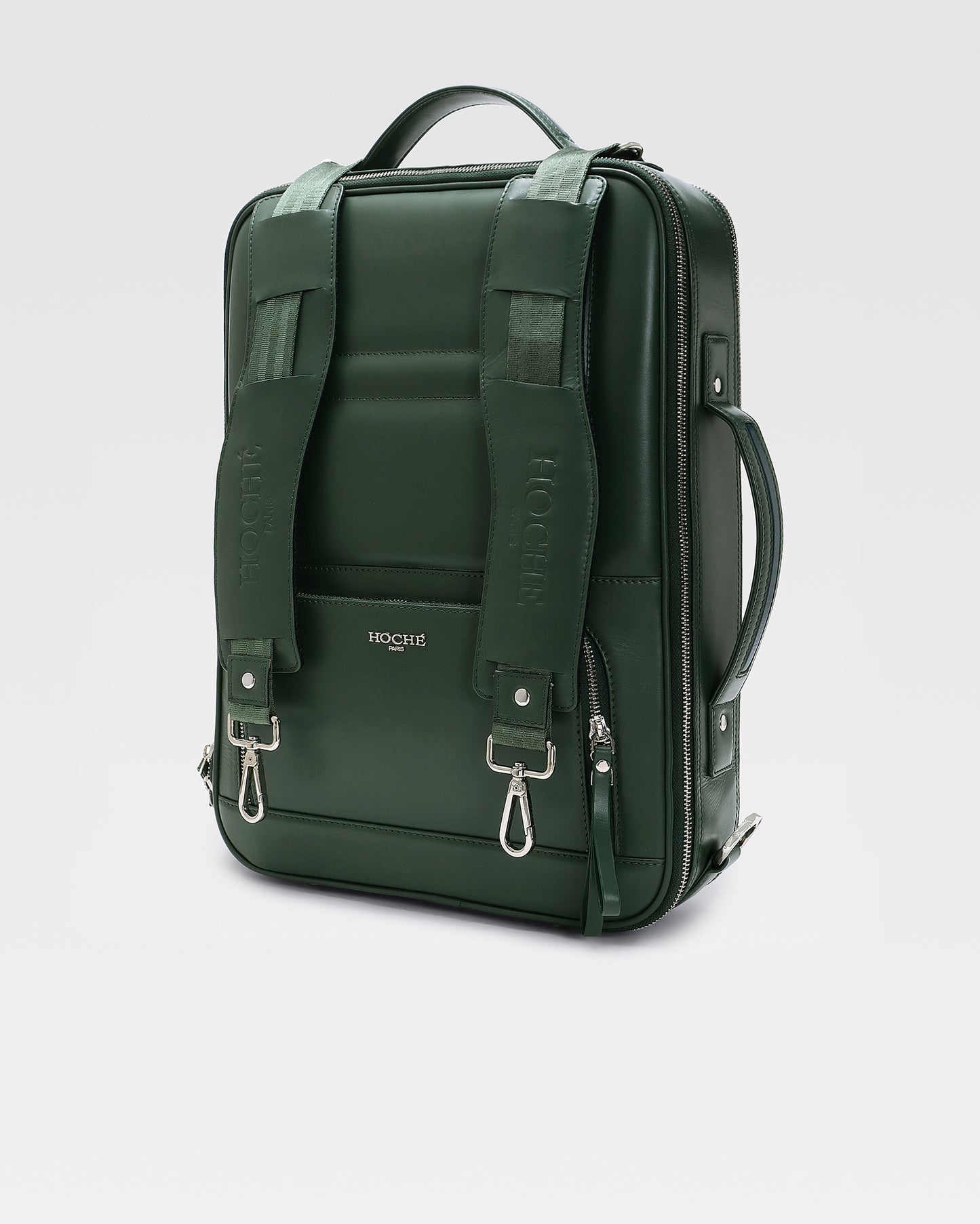 Side profile of UniSwitch olive green genuine leather laptop backpack for men in India, showcasing its convertible 3-in-1 design for professionals.