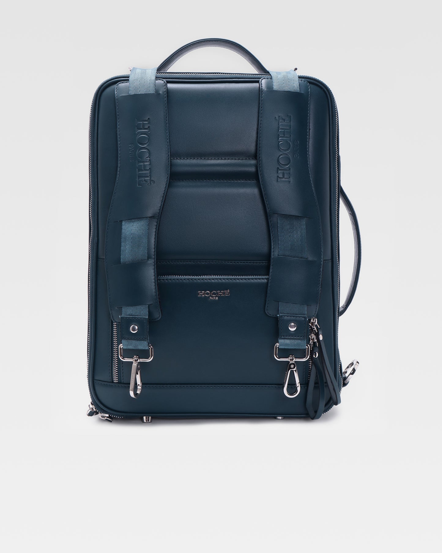 Front view of UniSwitch 3 in 1 convertible dark blue branded genuine leather backpack for men in India, featuring a sleek and premium design for work and travel