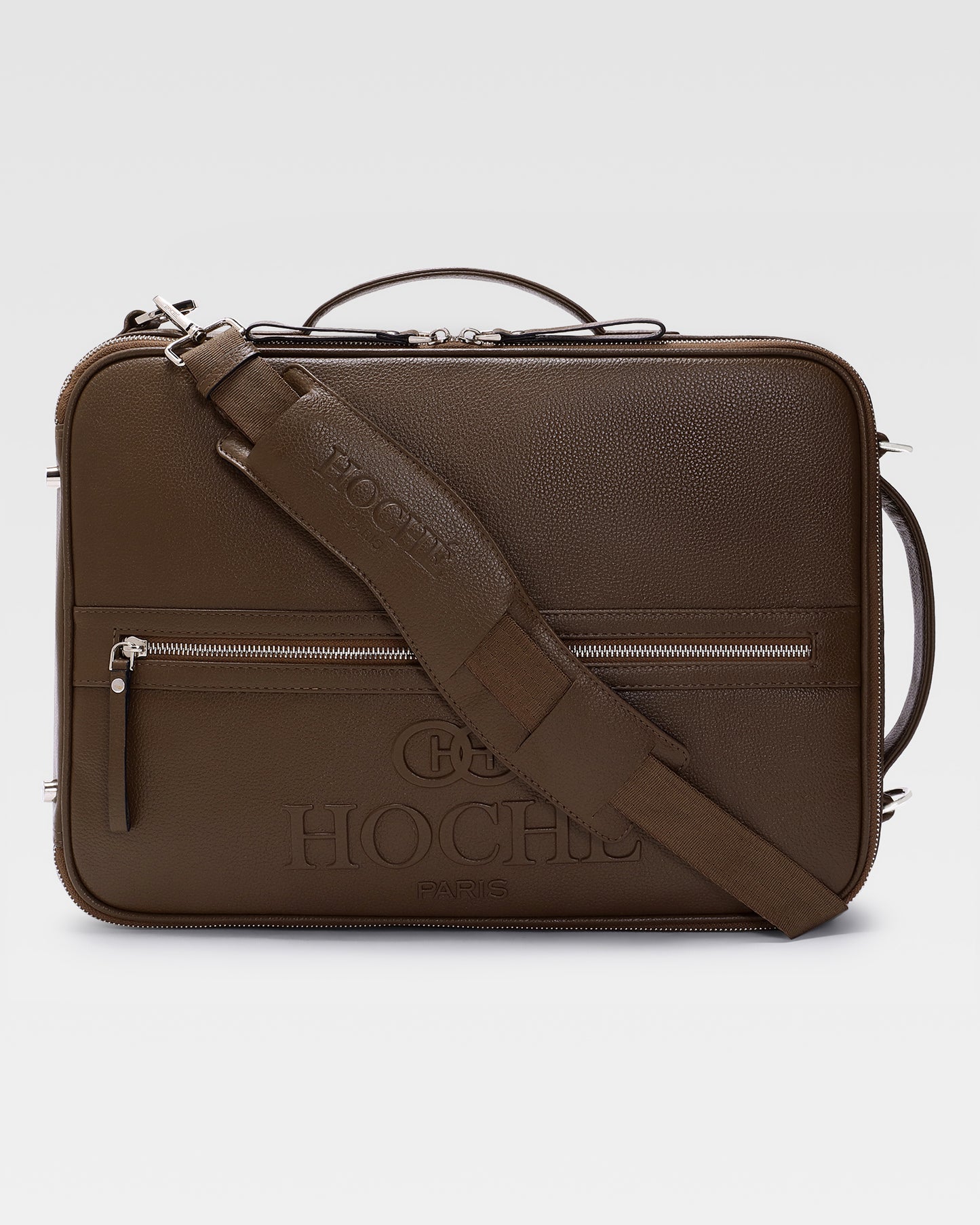 Briefcase view of UniSwitch dark brown branded genuine leather 3 in 1 convertible genuine leather backpack for men in India, featuring ergonomic padded straps and a hidden trolley sleeve.