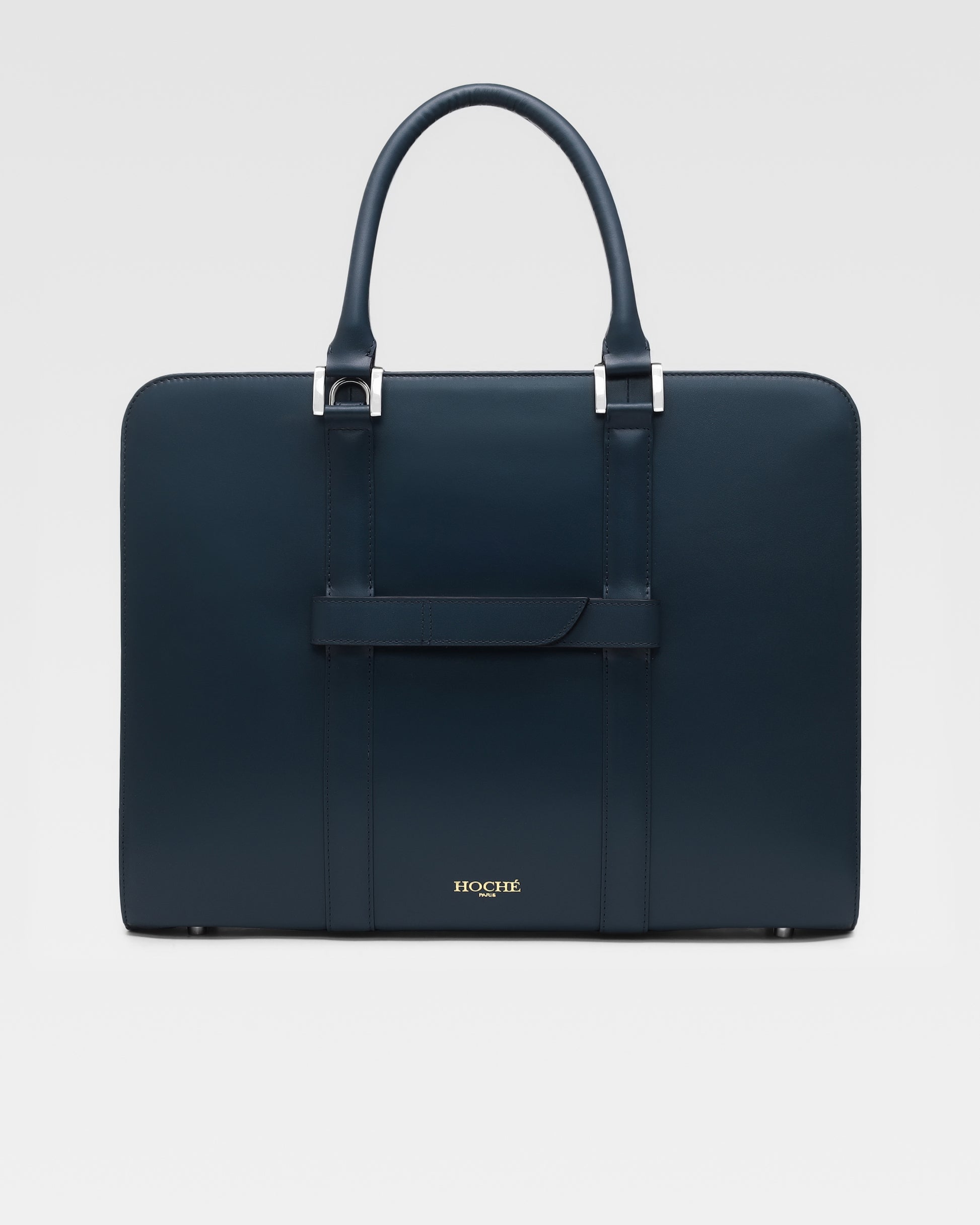 Back view of PinnaclePro dark blue leather laptop bag for men, featuring ergonomic handles, a trolley sleeve, and refined detailing