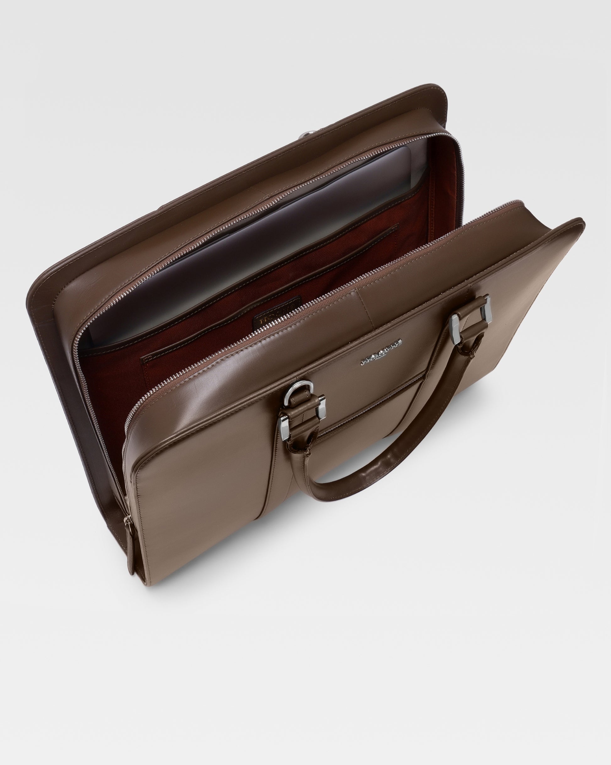 Open view of PinnaclePro dark brown branded leather laptop bag for men, showcasing a spacious interior, padded laptop compartment, and multiple organizers