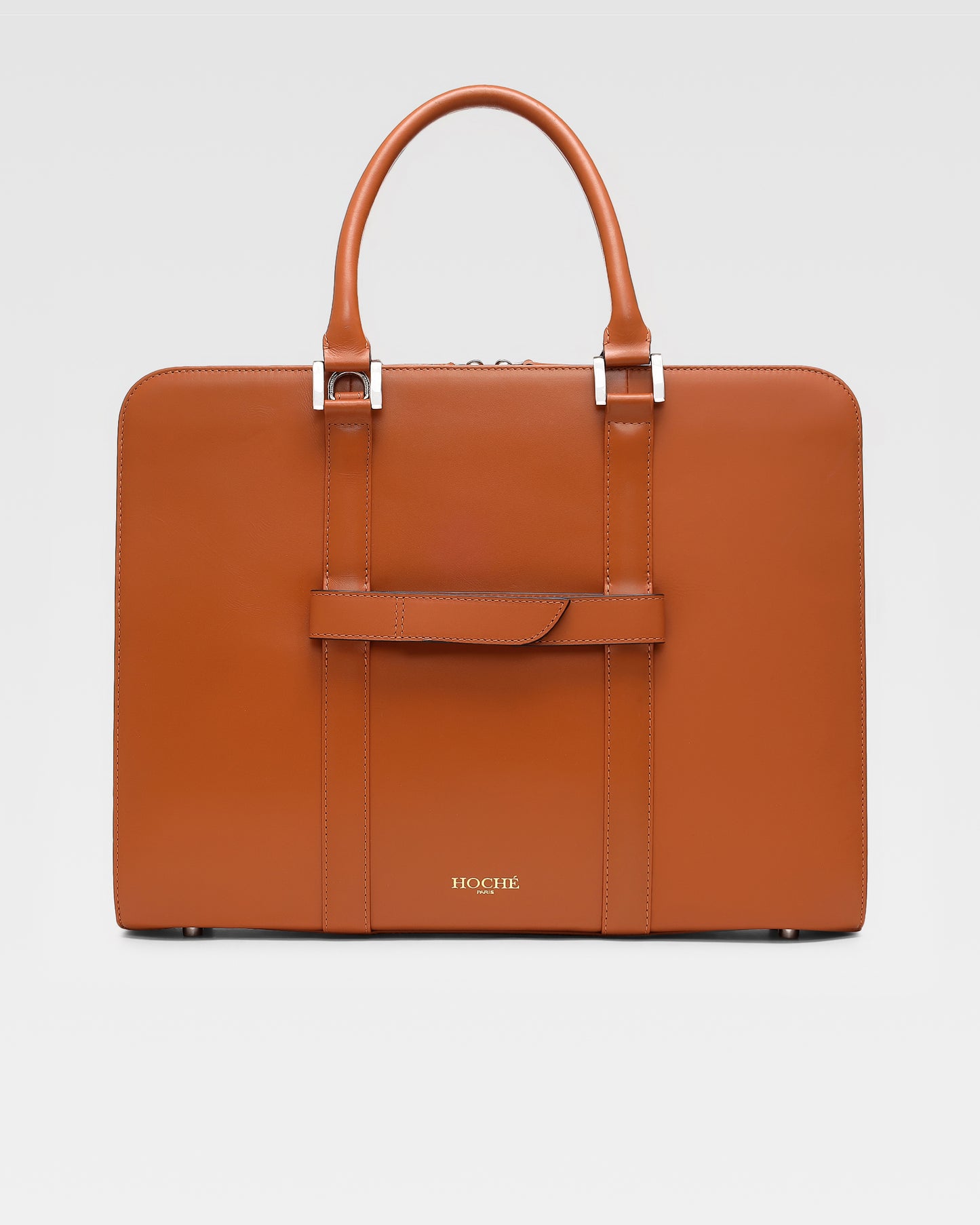 Back view of PinnaclePro Umber Tan genuine leather laptop bag for men in India, showcasing a detachable trolley strap, reinforced handles, and a sleek finish