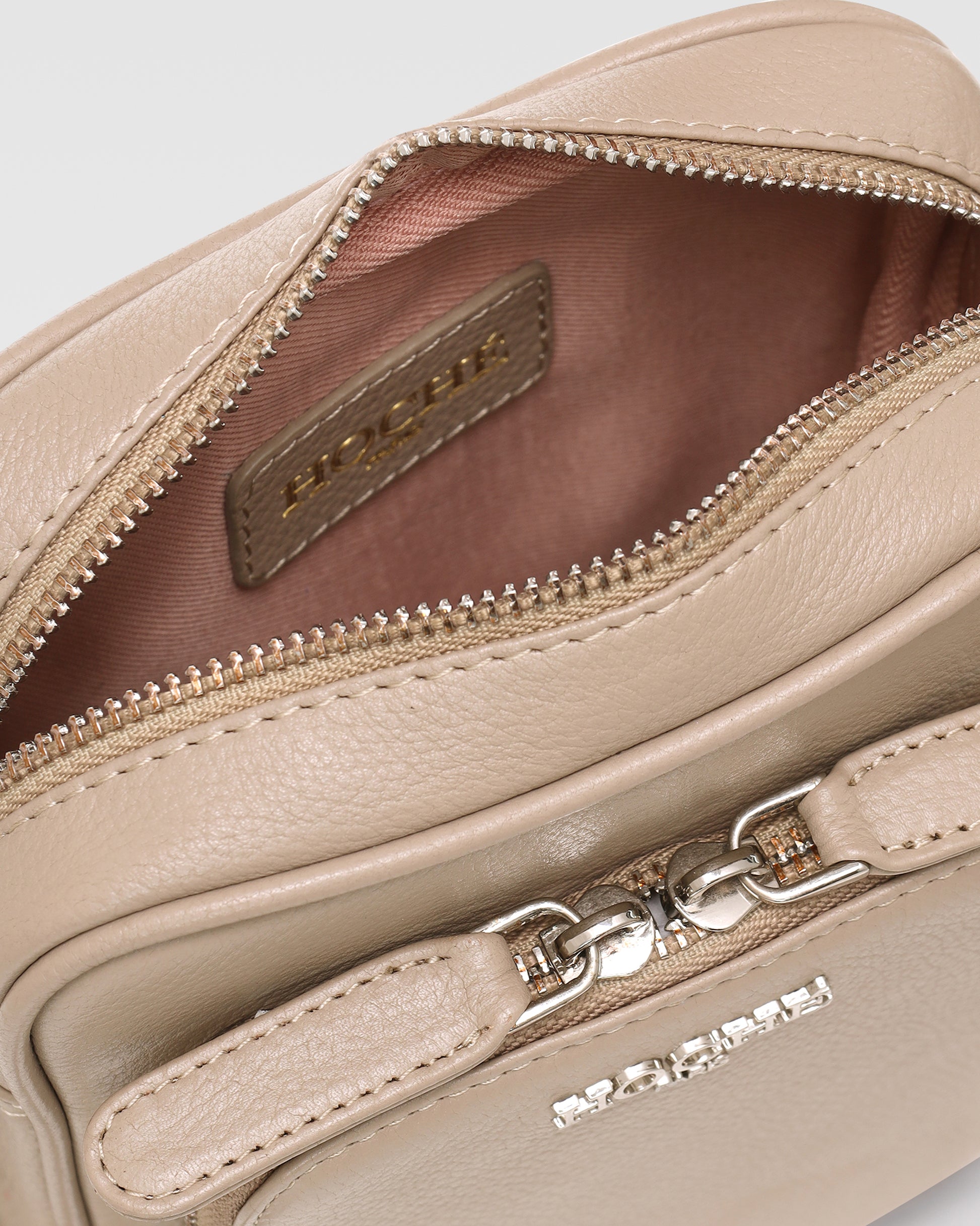 Close-up of Taupe genuine leather on men’s sling side bag – Grandeur by Hoche Paris