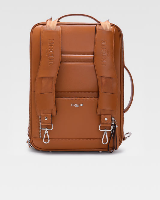 Front view of UniSwitch 3 in 1convertible Tan branded genuine leather backpack for men in India, featuring a sleek and premium design for work and travel