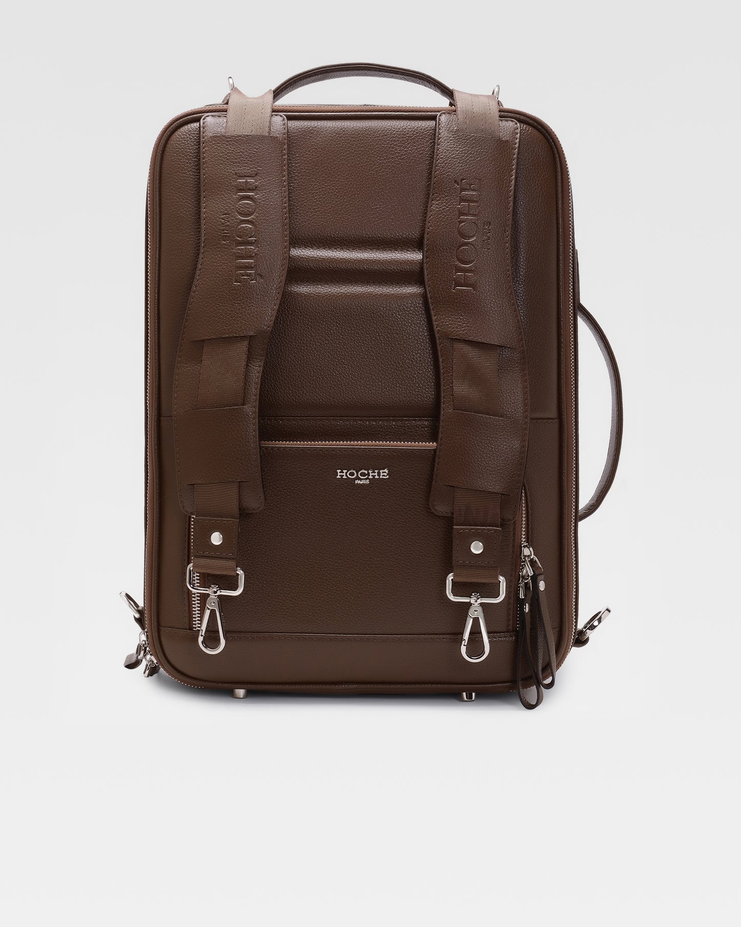 Front view of UniSwitch 3 in 1 convertible dark brown branded genuine leather backpack for men in India, featuring a sleek and premium design for work and travel